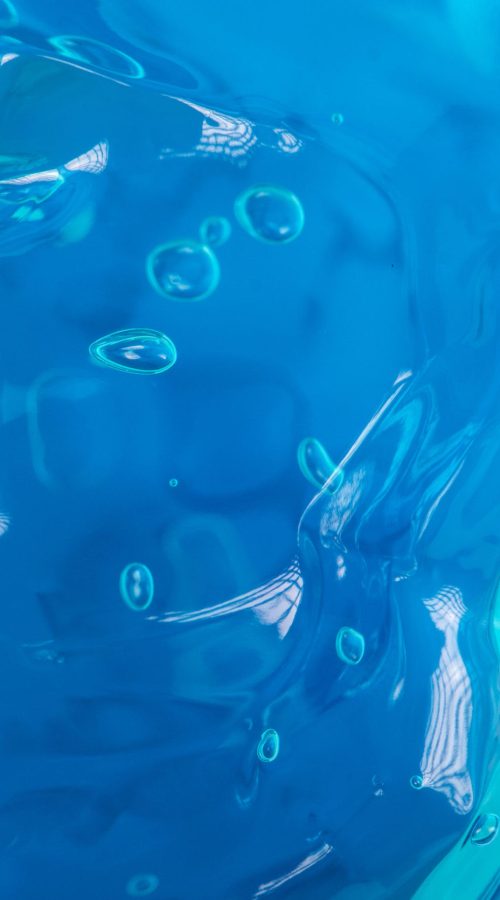 Blue liquid gel. Transparent skin care product